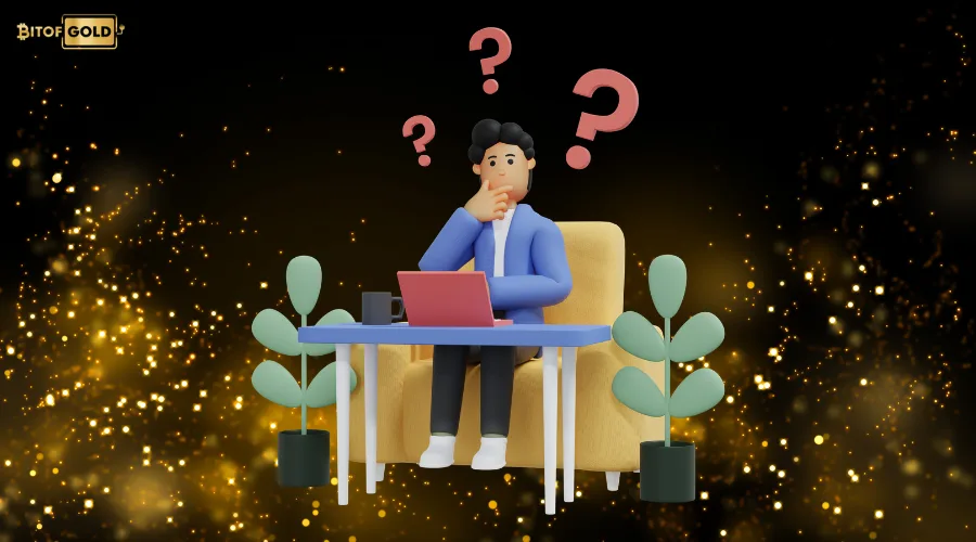 a thinking man sitting beside the workdesk